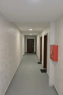 a corridor of an office building with a hallway at M Apartments in Belgrade