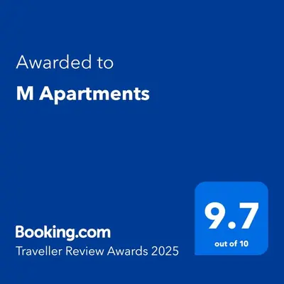 a blue screen with the text awarded to m applicants at M Apartments in Belgrade