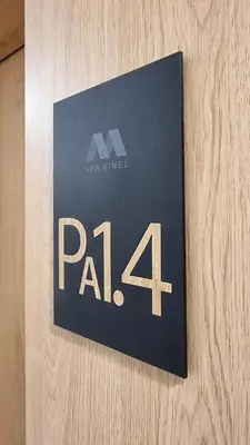 a sign that says palimum on a wall at Alek Place in Novi Beograd