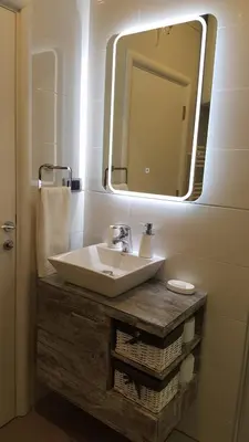 a bathroom with a sink and a mirror at Apartment Div 2 in Dušanovac (historical)