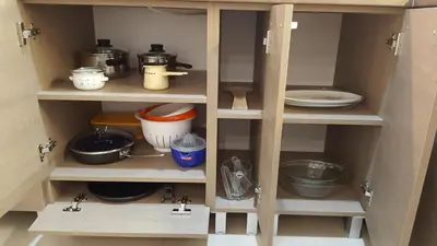 a toy cabinet filled with pots and pans at Apartment Div 1 in Dušanovac (historical)