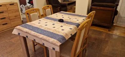a table with a quilt on top of it at Julija 3 in Pančevo