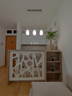 a living room with a couch and a table at Galija apartment in Belgrade