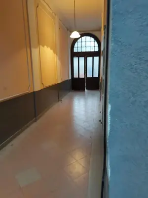 an empty hallway with a door in a building at Apartman mikikiki in Belgrade