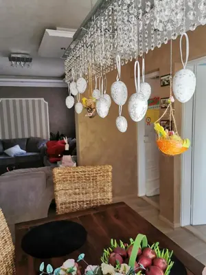 a living room with a bunch of chandeliers at Lux apartman Lena in Belgrade