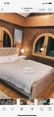 a poster of a bedroom with a large bed at Apartman17 in Belgrade