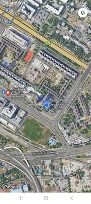 an overhead view of a city intersection with a highway at Sava Centar in Novi Beograd
