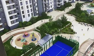 an aerial view of a playground with a tennis court at Apartman Marija in Voždovac