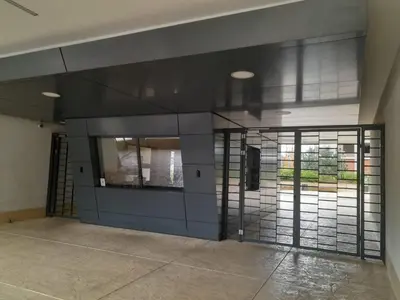 an empty room with a large glass door at Apartman Marija in Voždovac