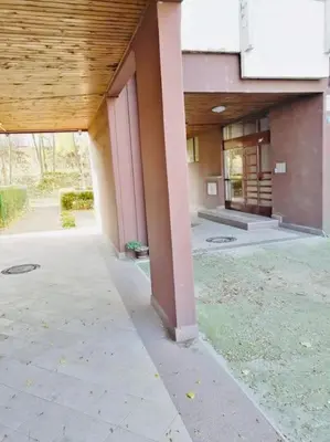 an outside view of a building with pink columns at Dorcol hideaway in Belgrade
