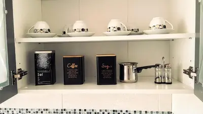 a shelf with some items on it in a kitchen at Peti in Belgrade