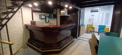 a bathroom with a sink in a room at Old Café Spa Apartment - Unique space in Belgrade