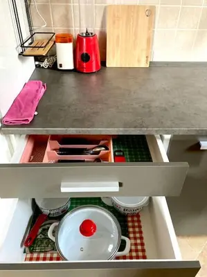 a drawer in a kitchen with a pan in it at Amazing Memories in Belgrade