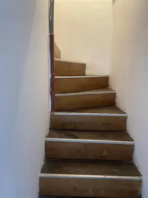 a set of stairs in a room at Journey Home in Belgrade