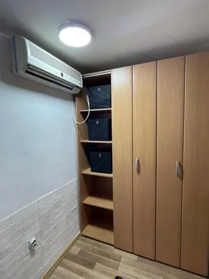 a room with a closet with a air conditioner at Journey Home in Belgrade