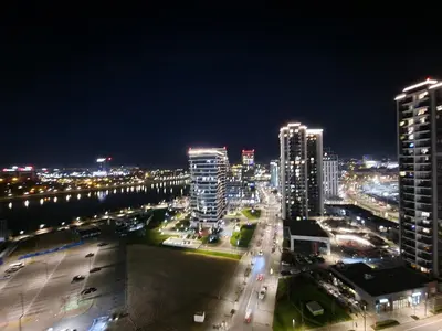 a city skyline at night with buildings and traffic at Beograd na Vodi - BW ARCADIA LUXURY in Belgrade