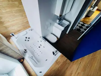 an overhead view of a bathroom with a white sink at Vracar hideaway with private garage in Belgrade