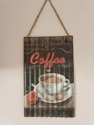 a sign that says coffee with a cup of coffee at Stella Apartment in Karaburma