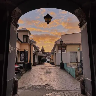 an archway leading to a street in a city at Katera in Belgrade