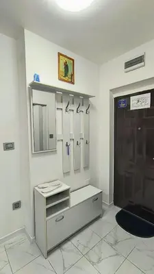 a bathroom with a vanity with mirrors and a sink at TALIJA in Vračar (historical)