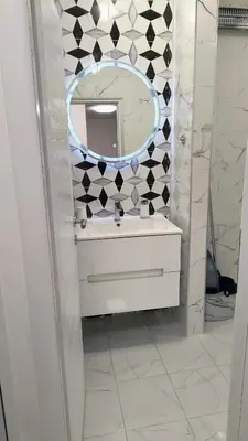 a bathroom with a sink and a mirror at TALIJA in Vračar (historical)