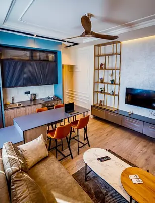 a living room with a couch and a table at Miha Premium Apartment in Belgrade