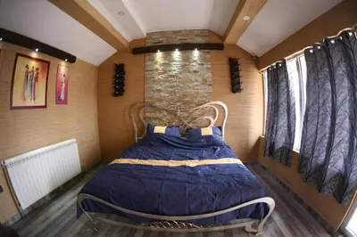 a bedroom with a bed in a room at Rooms&Restaurant 43 in Belgrade