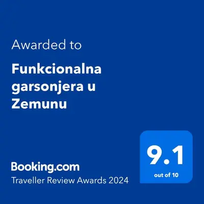 a screenshot of a cell phone with the text awarded to filippiniangaritarian at Funkcionalna garsonjera u Zemunu in Zemun