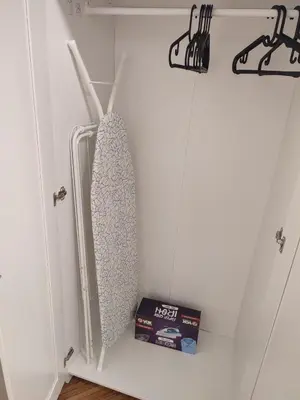 a white closet with a tie and a box in it at Belgrade apartment Bulevar II in Belgrade