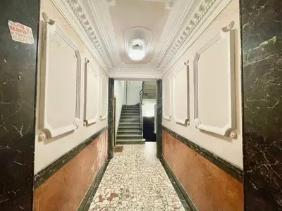 an empty hallway with a staircase in a building at Despot in Belgrade