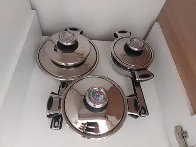 a set of three metal dishes sitting on a counter at PARK APARTMENTS Belgrade Waterfront in Sajmište