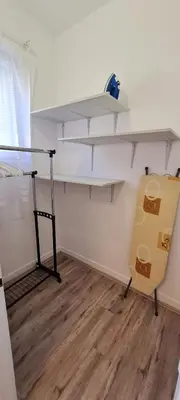 a room with a bunk bed and a desk at JULIJA apartment in Belgrade