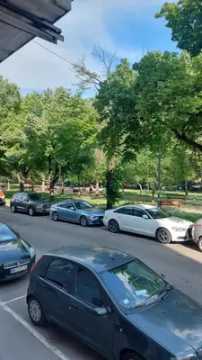 a group of cars parked in a parking lot at ODMORKO Zemun in Belgrade