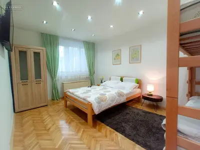 a bedroom with a bed and a bunk bed at ODMORKO Zemun in Belgrade