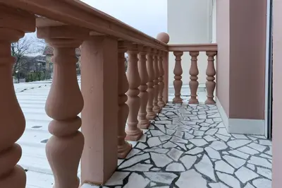 a balcony with a staircase with a stone floor at Smeštaj Tank, Pančevo in Salaši