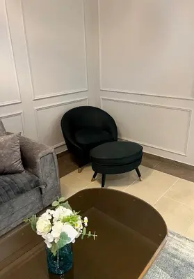 a living room with a couch and a coffee table at Stepa in Belgrade