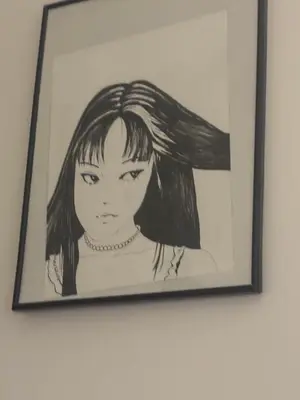 a drawing of a girl on a wall at Gaga 1 in Filmski Grad