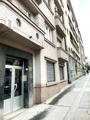 a building with a door on the side of a street at TRIANGLE CITY Apartment 1 in Belgrade