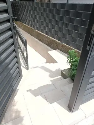 a set of stairs with a door and a plant at Aurora in Zvezdara