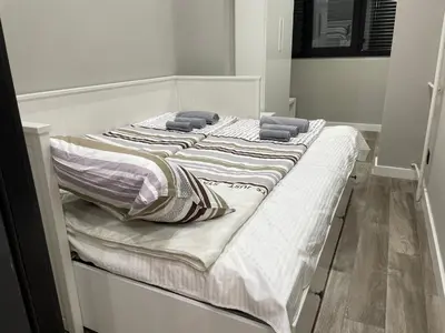 two beds with pillows on them in a bedroom at Alisa Novi Beograd in Bežanija