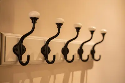 a group of eight lights hanging on a wall at Cozy, Comfortable Apt Skadarlija in Belgrade