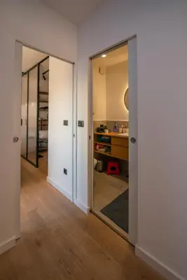 an empty room with a mirror and a bedroom at Roof terrace in the heart of Belgrade in Belgrade