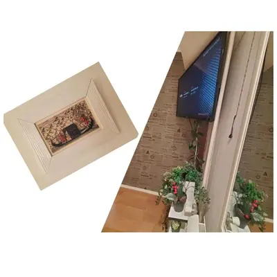 an overhead view of a living room with a fireplace and a television at Glorry M in Belgrade