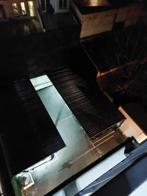 an overhead view of an escalator in a building at Apartman M 21 in Karaburma