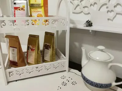 a shelf with a tea set and a tea pot at ATELIER 12, Feeling like an artist! PROMO PRICE in Belgrade