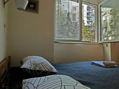 a bedroom with two beds and a window at ATELIER 12, Feeling like an artist! PROMO PRICE in Belgrade