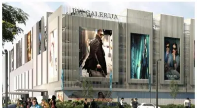 a large building with people standing outside of it at Belgrade Waterfront Premium in Belgrade