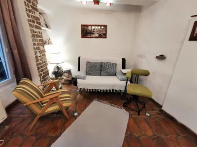 a living room with a couch and chairs at Hidden Gem on Prime Location in Belgrade
