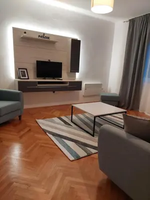 a living room with a couch and a coffee table at Dalmatinska apartment in Belgrade