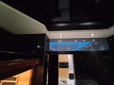 a room with a ceiling with a blue light at Lux Spa Apartman na Vračaru in Vračar (historical)